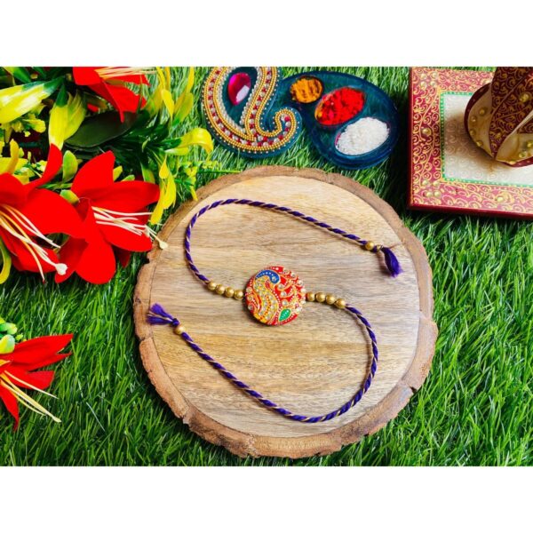 Beautiful Handpainted Clay Rakhi For Your Brother And Bhabhi