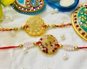 Beautiful Resinart Rakhi For Your Brother And Bhabhi