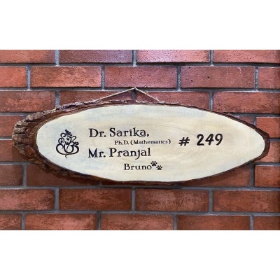 Engraved wooden nameplate