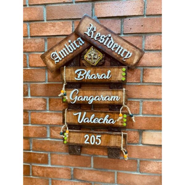 Ganesha Wooden Hut Nameplate A Symbol of Family Love and Blessings
