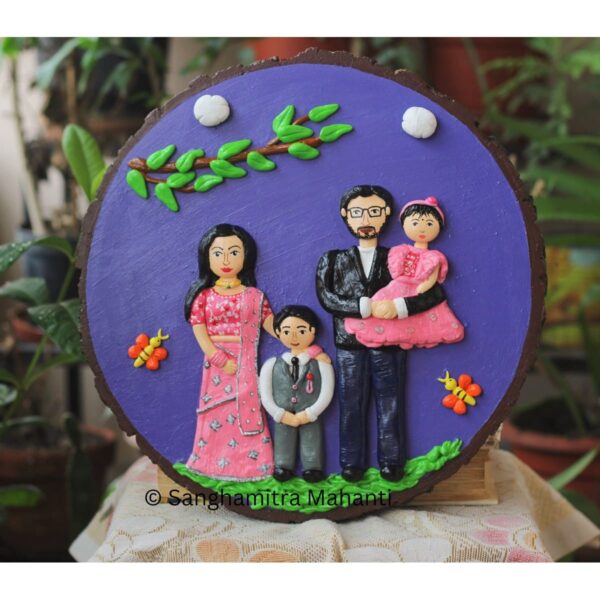 Handmade Human Figures On Wooden Log