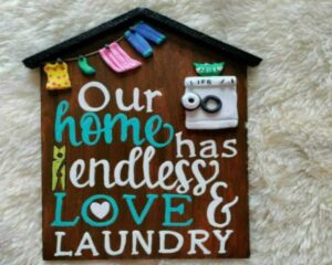 House shaped laundry area wall decor 1