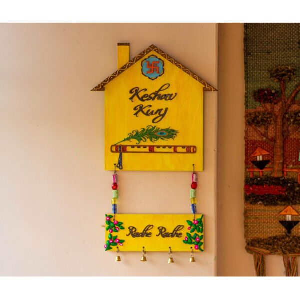 Hut shaped krishna themed nameplate