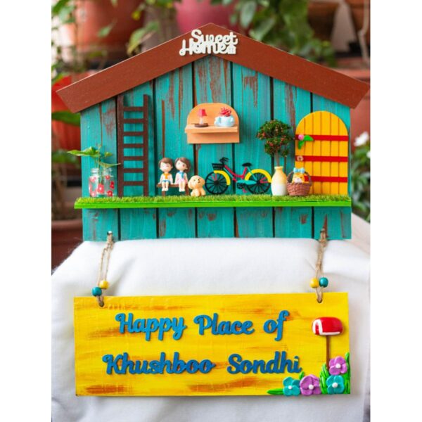 Hut shaped nameplate with miniatures 1