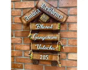 Lord Ganesh Wooden Hut Family Nameplate 1