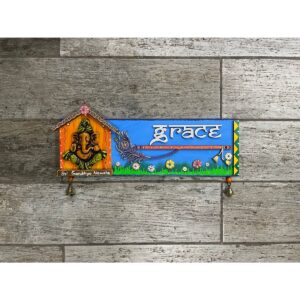 Welcome Positive Energy with Our Ganesha Nameplate with Feather and Flute (1)