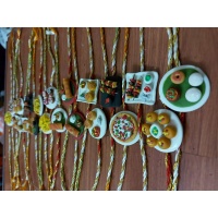 Beautiful Customized Peacock Rakhi For Your Brother And Bhabhi food rakhi