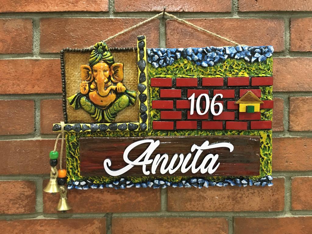 ganesha on bricks wall name plate for house housewarming